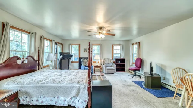 a view of a living room and dining area