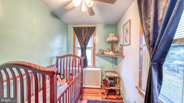a view of a staircase with furniture and a window