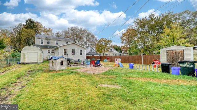 a house view with a sitting space and garden