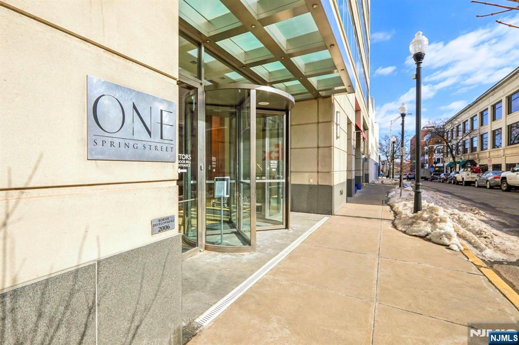 1 Spring Street, Unit 1004 New Brunswick, NJ 08901 - Photo 2 of 26 a view of a street with door