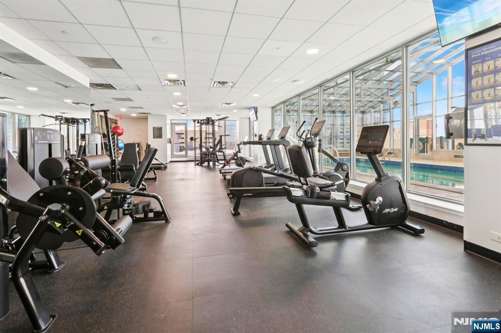 1 Spring Street, Unit 1004 New Brunswick, NJ 08901 - Photo 22 of 26 a view of a room with gym equipment