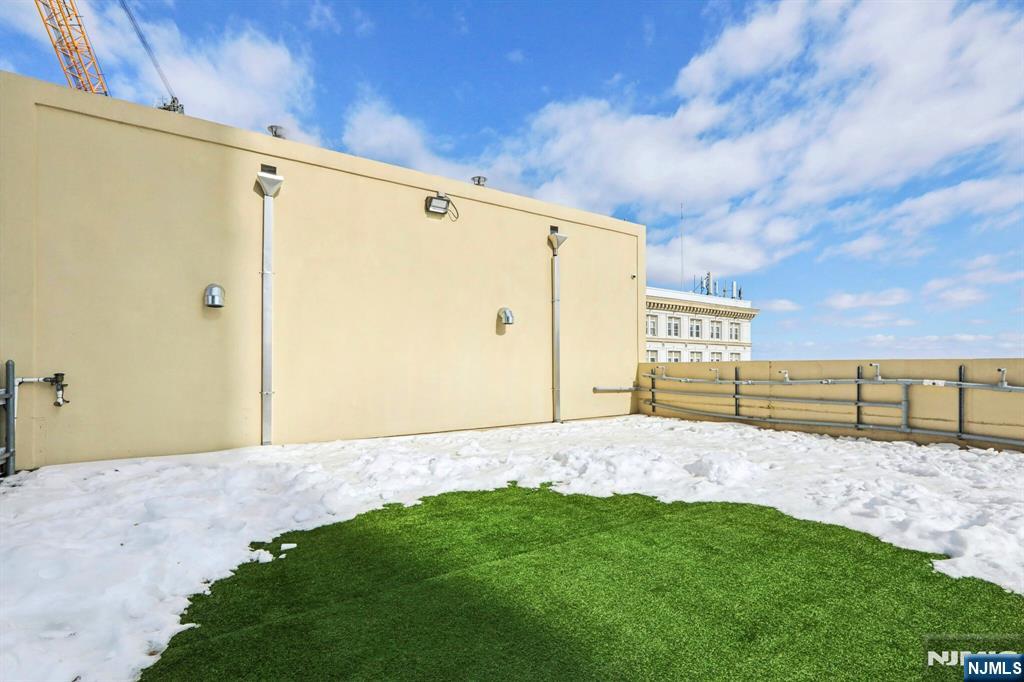 1 Spring Street, Unit 1004 New Brunswick, NJ 08901 - Photo 24 of 26 a view of a backyard