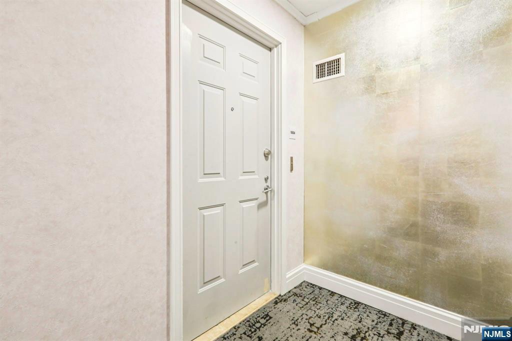 1 Spring Street, Unit 1004 New Brunswick, NJ 08901 - Photo 3 of 26 a bathroom with a shower