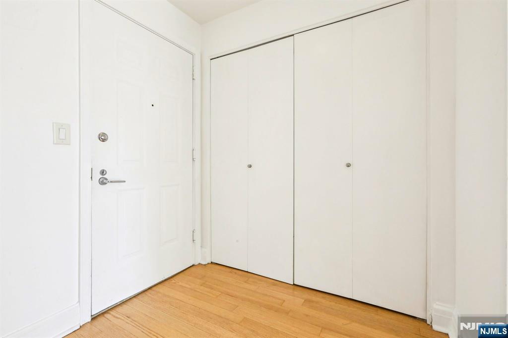 1 Spring Street, Unit 1004 New Brunswick, NJ 08901 - Photo 4 of 26 a view of a small room