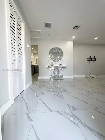 a very nice looking room with a chair