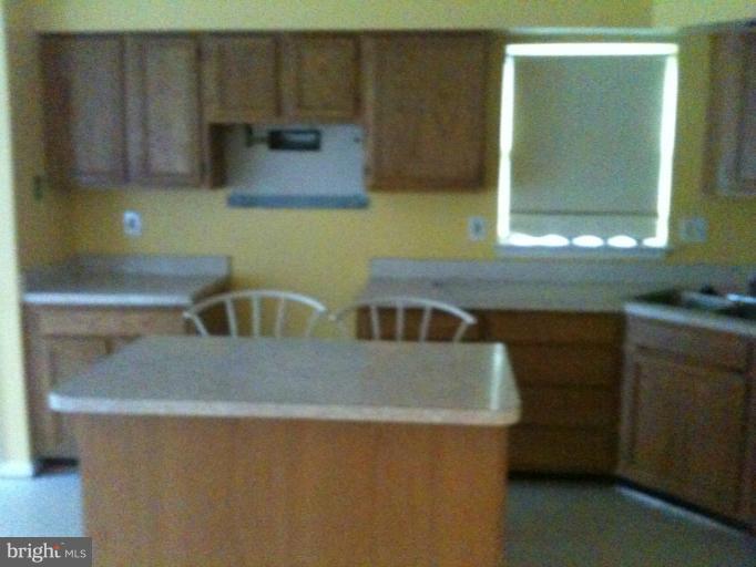 9506 Utica Place Springdale, MD 20721 - Photo 5 of 23 Kitchen