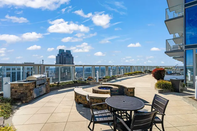 a view of a balcony with city view