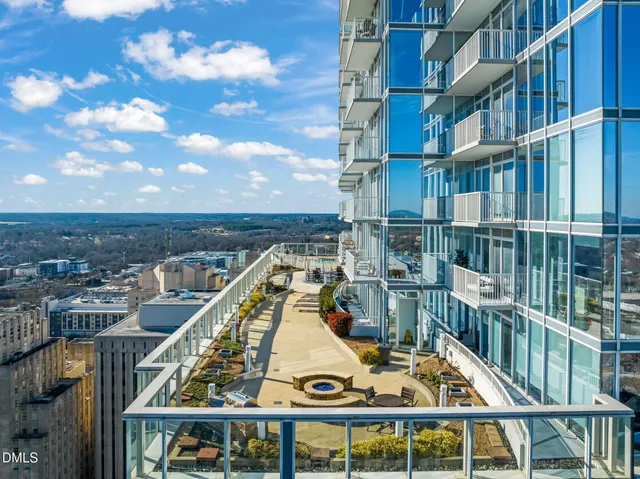 a view of balcony with a floor to ceiling window