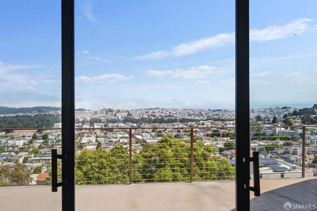 a view of a city from a balcony