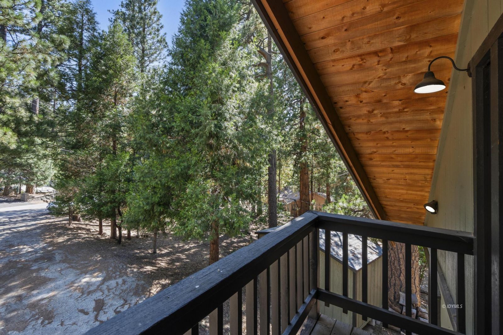 24747 Fern Valley Road Idyllwild, CA 92549 - Photo 18 of 42 a view of a wooden balcony with an outdoor space