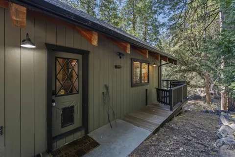 a backyard of a house with seating space