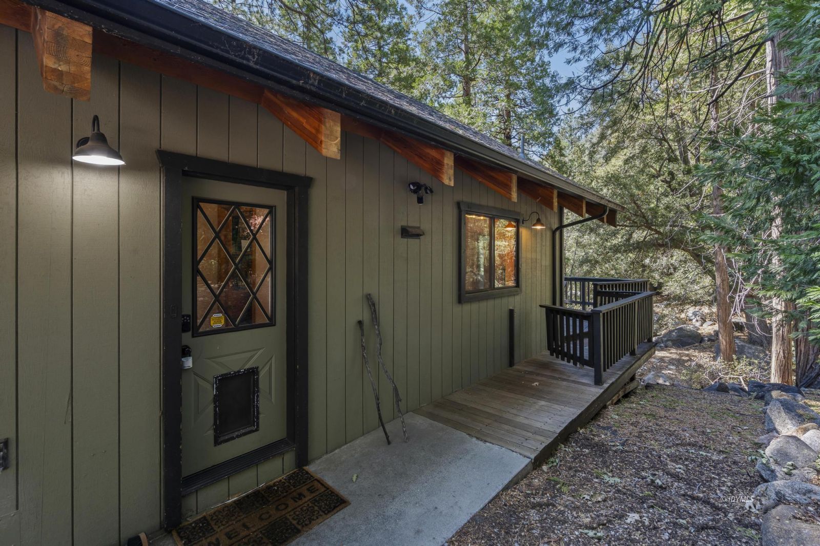 24747 Fern Valley Road Idyllwild, CA 92549 - Photo 6 of 42 a backyard of a house with seating space