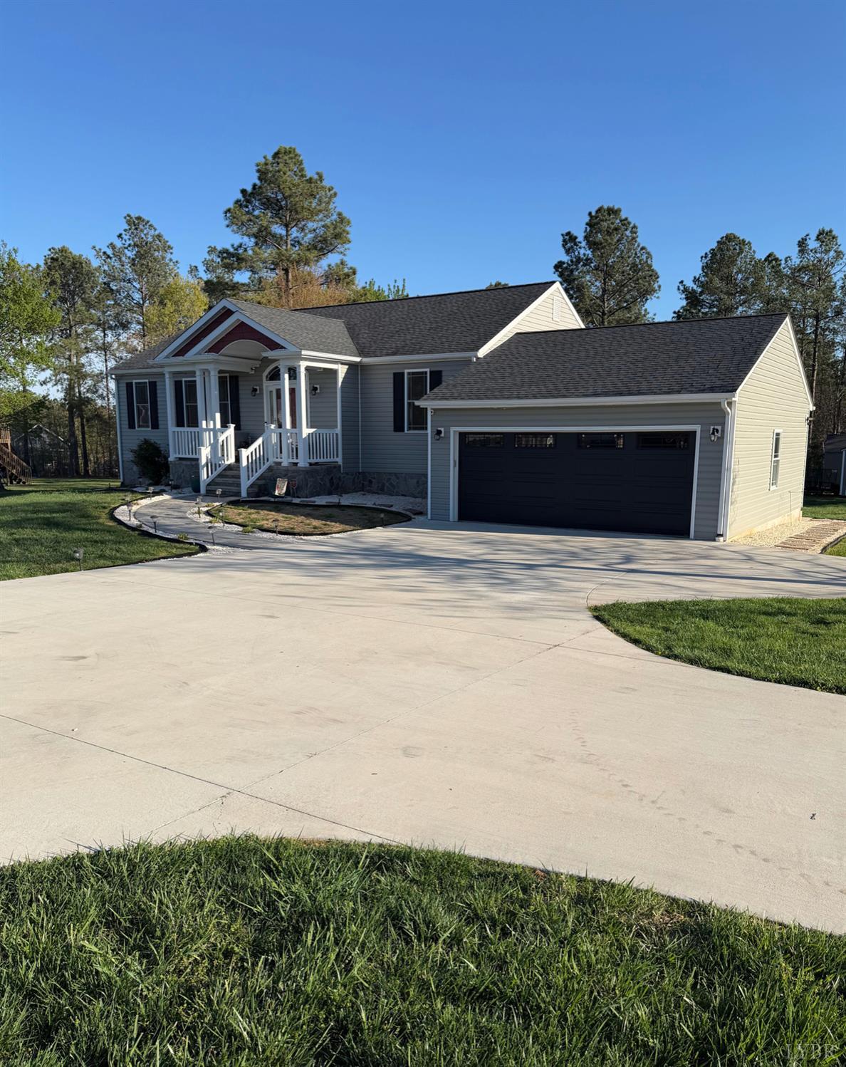 a front view of a house with yard