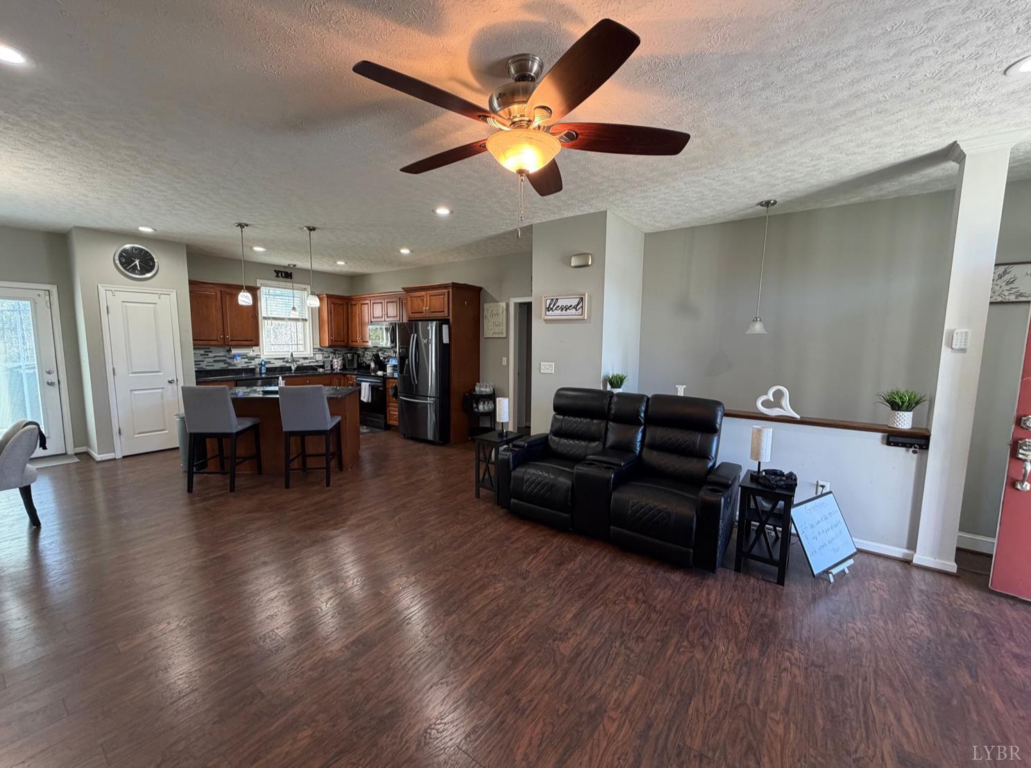 271 Pleasant Ridge Drive Madison Heights, VA 24572 - Photo 11 of 52 a living room with furniture and wooden floor