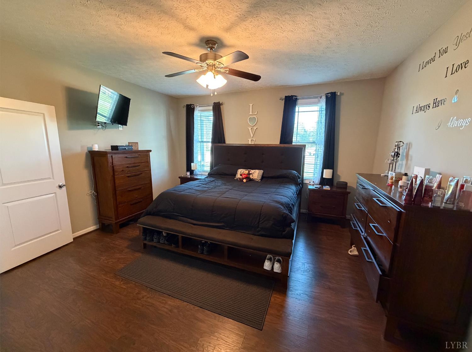 271 Pleasant Ridge Drive Madison Heights, VA 24572 - Photo 15 of 52 a bedroom with furniture and wooden floor