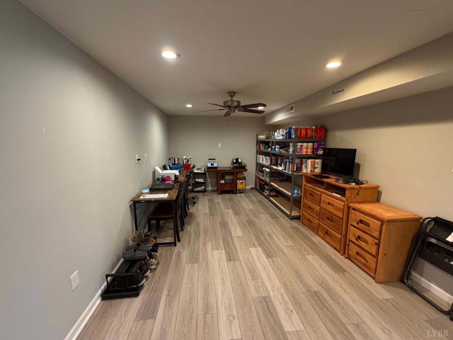 271 Pleasant Ridge Drive Madison Heights, VA 24572 - Photo 29 of 52 a living room with furniture and a flat screen tv
