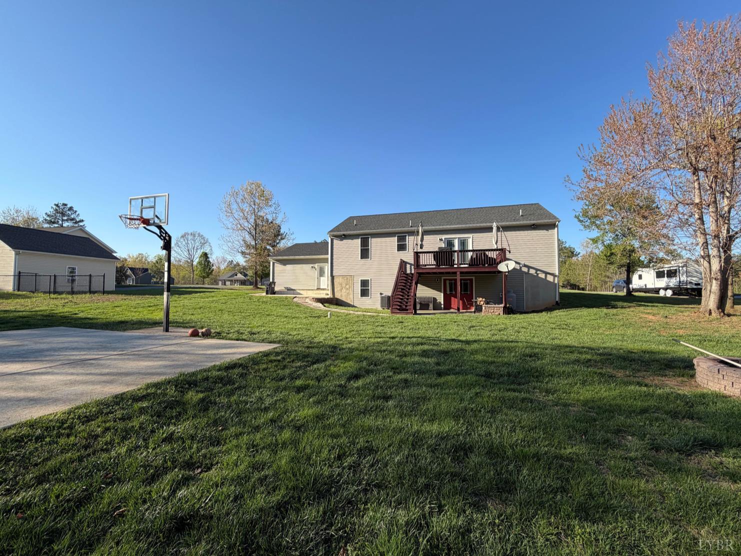 271 Pleasant Ridge Drive Madison Heights, VA 24572 - Photo 37 of 52 a view of a house with a backyard