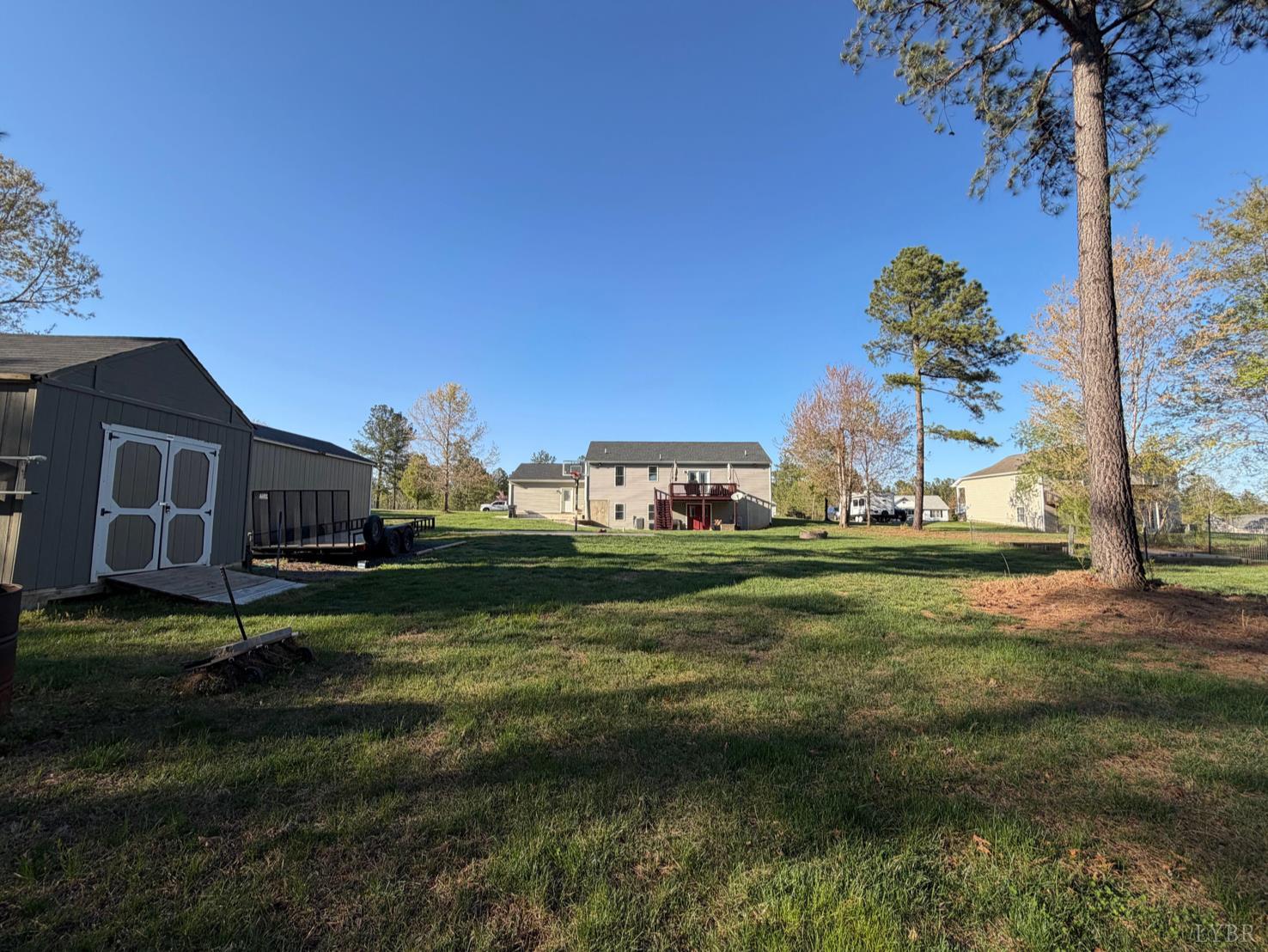 271 Pleasant Ridge Drive Madison Heights, VA 24572 - Photo 4 of 52 a view of a house with a big yard and large trees