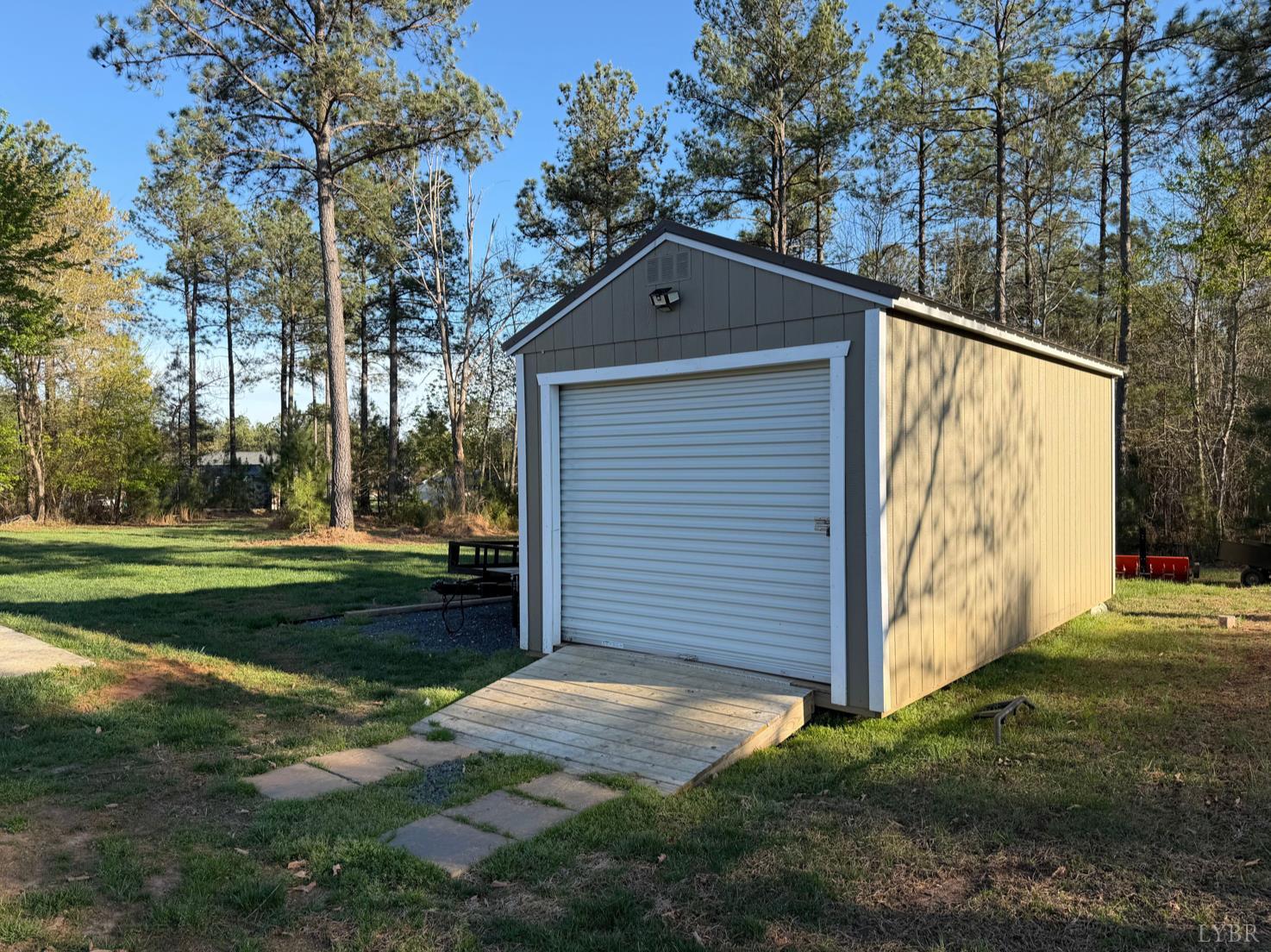 271 Pleasant Ridge Drive Madison Heights, VA 24572 - Photo 42 of 52 a view of backyard with tree