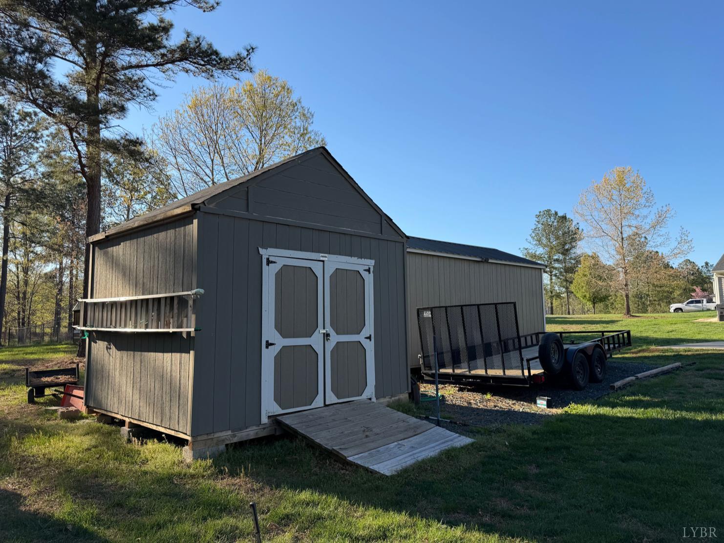 271 Pleasant Ridge Drive Madison Heights, VA 24572 - Photo 43 of 52 a view of backyard with a barn and a large cactus tree