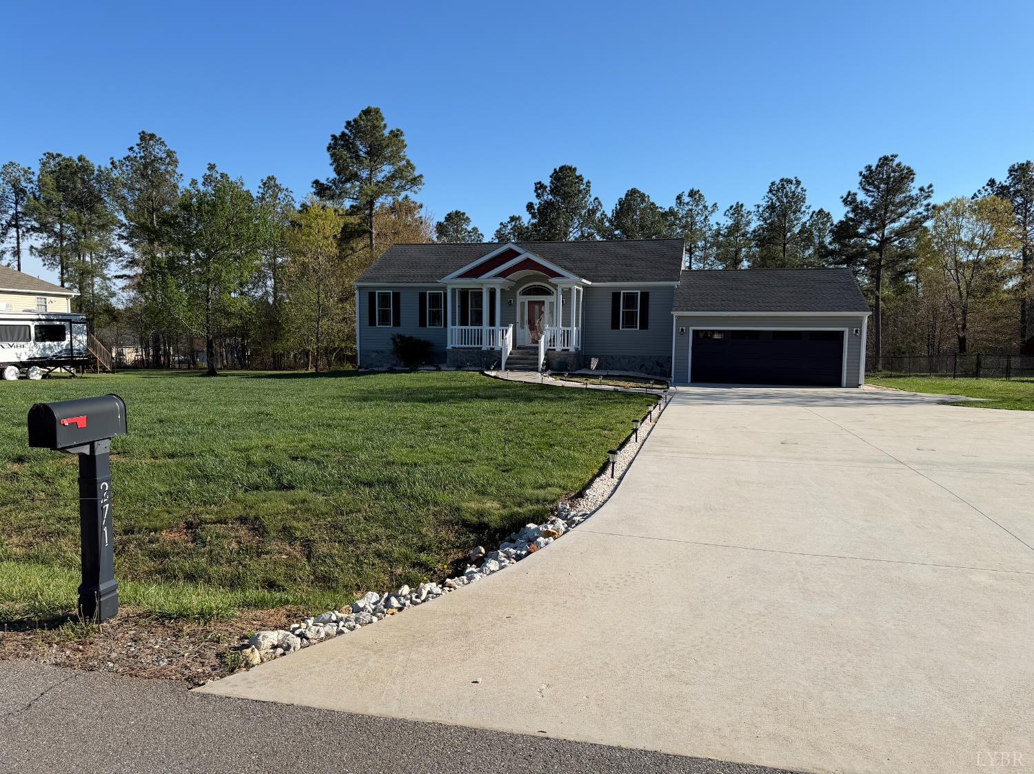 271 Pleasant Ridge Drive Madison Heights, VA 24572 - Photo 49 of 52 a front view of a house with a yard