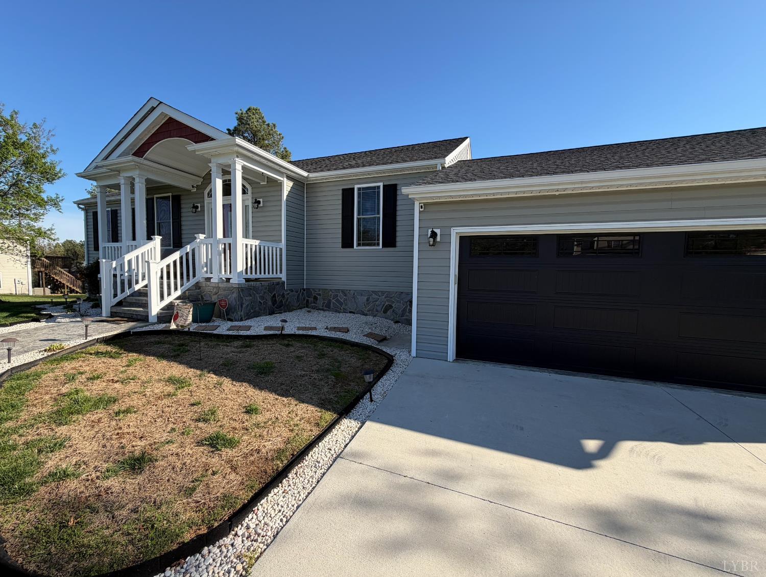 271 Pleasant Ridge Drive Madison Heights, VA 24572 - Photo 5 of 52 a front view of a house with yard