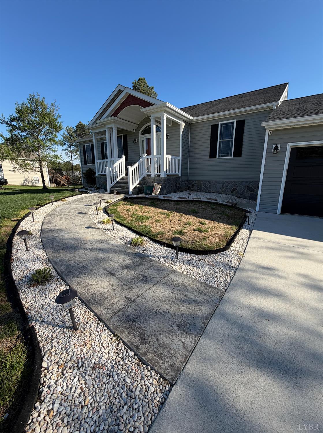 271 Pleasant Ridge Drive Madison Heights, VA 24572 - Photo 52 of 52 a front view of a house with yard