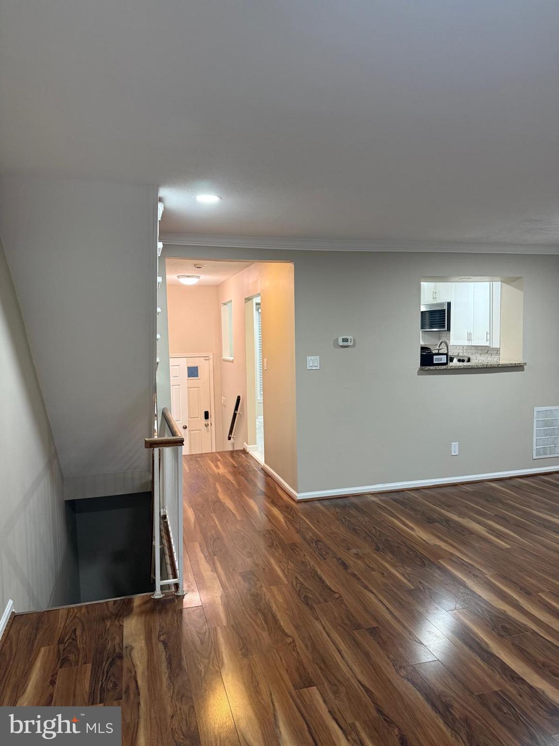 45 Fendall Avenue Alexandria, VA 22304 - Photo 6 of 45 a view of a room with wooden floor and staircase