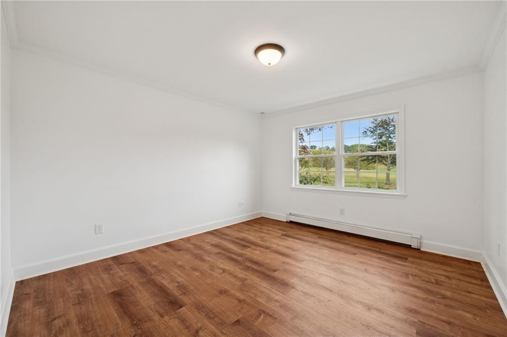 2 Deerfield Lane Indiana, PA 15701 - Photo 14 of 45 an empty room with wooden floor and windows