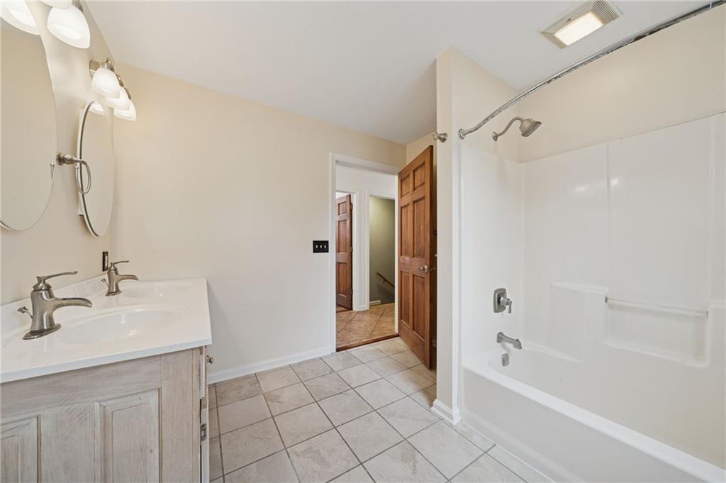 2 Deerfield Lane Indiana, PA 15701 - Photo 17 of 45 a bathroom with a bath tub and a sink