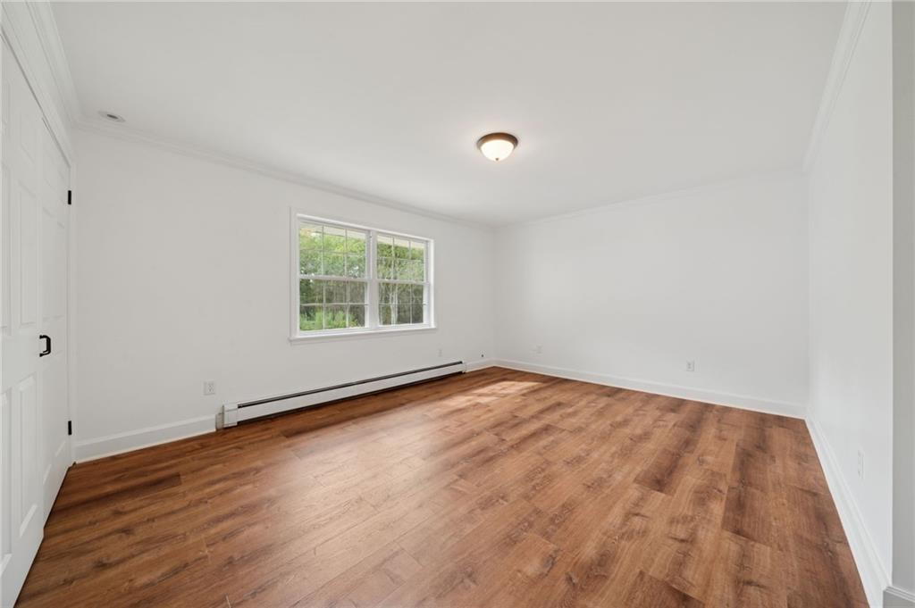 2 Deerfield Lane Indiana, PA 15701 - Photo 21 of 45 an empty room with wooden floor and windows