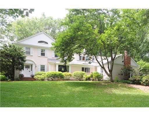 1 Allwood Road Darien, CT 06820 - Photo 1 of 20 a front view of a house with a garden