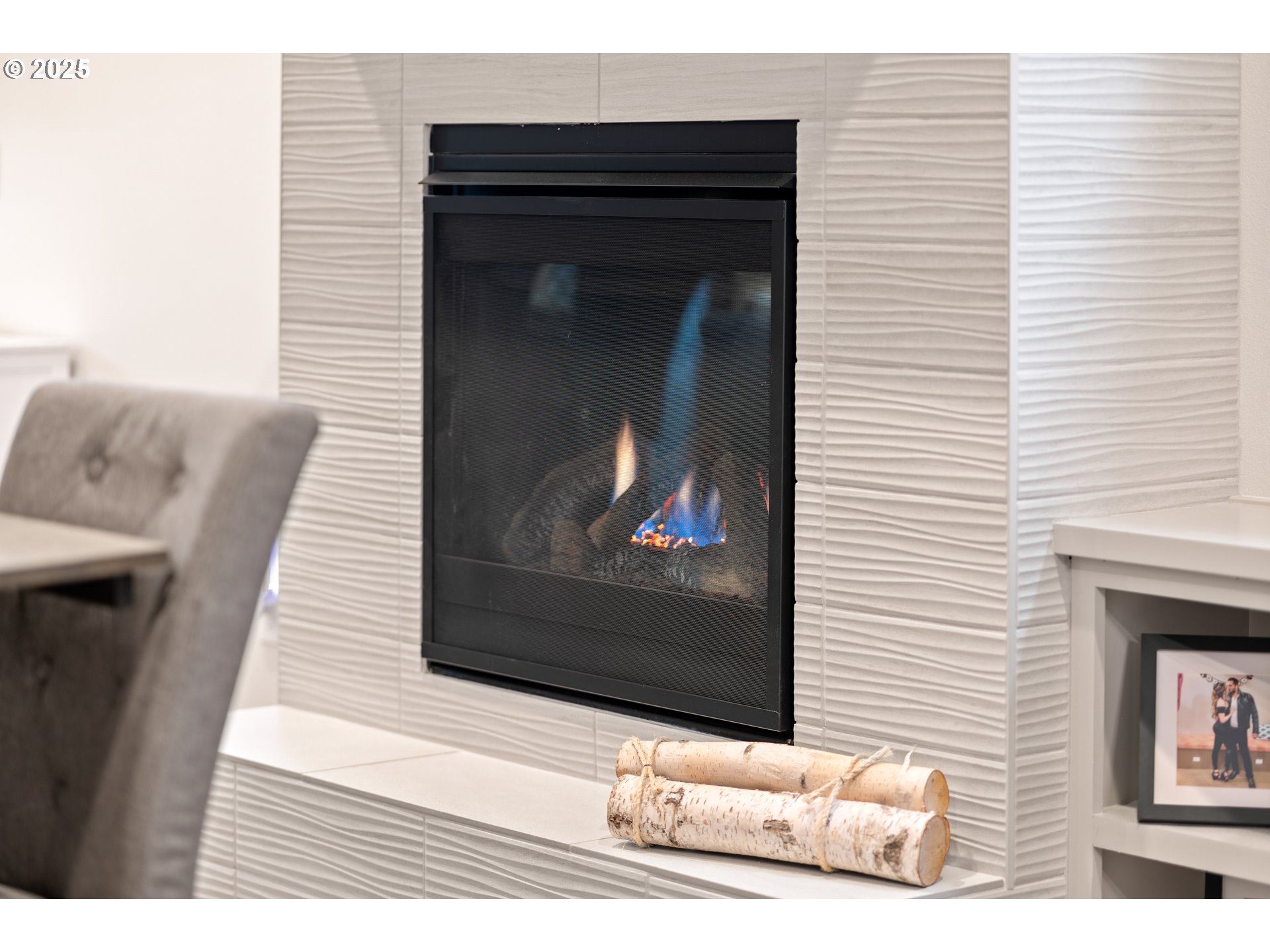 20211 Glen Vista Road Bend, OR 97703 - Photo 12 of 32 a living room with furniture and a fireplace