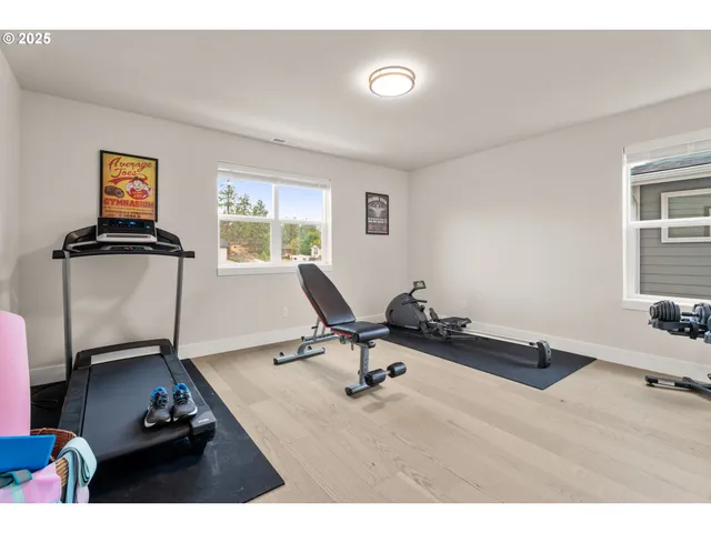 a bathroom with a sink a mirror and a shower