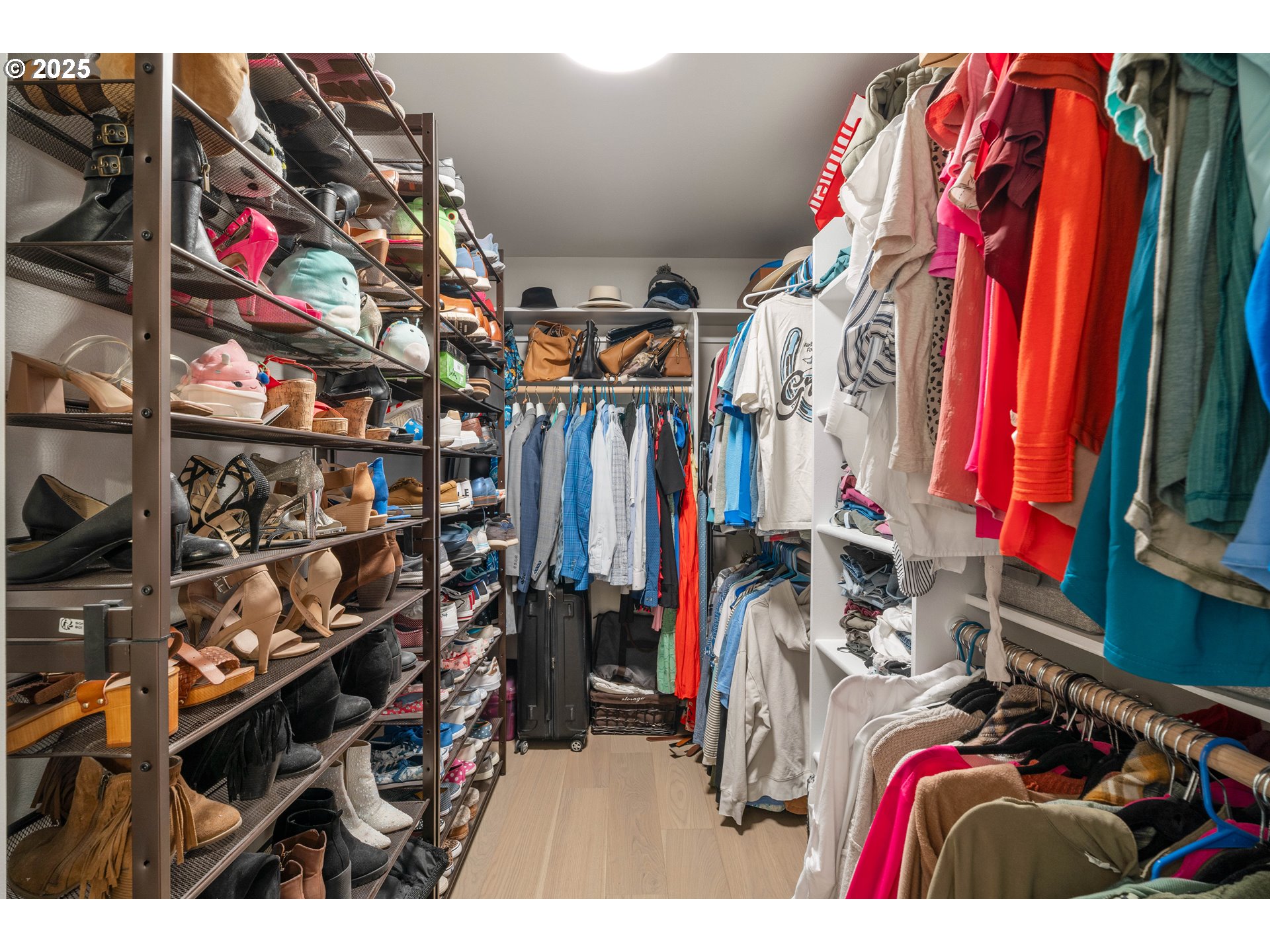 20211 Glen Vista Road Bend, OR 97703 - Photo 30 of 32 a view of walk in closet with clothes and shoes