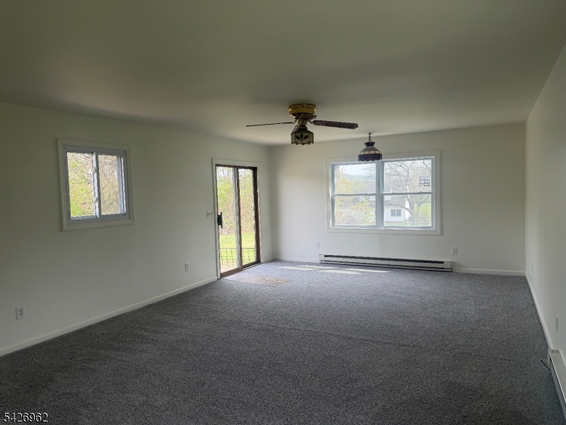 630 Dewey Avenue, Unit B Alpha, NJ 08865 - Photo 4 of 6 a view of an empty room with a window