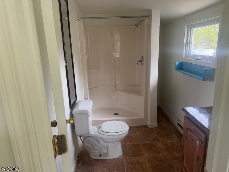 630 Dewey Avenue, Unit B Alpha, NJ 08865 - Photo 6 of 6 a bathroom with a toilet and a shower
