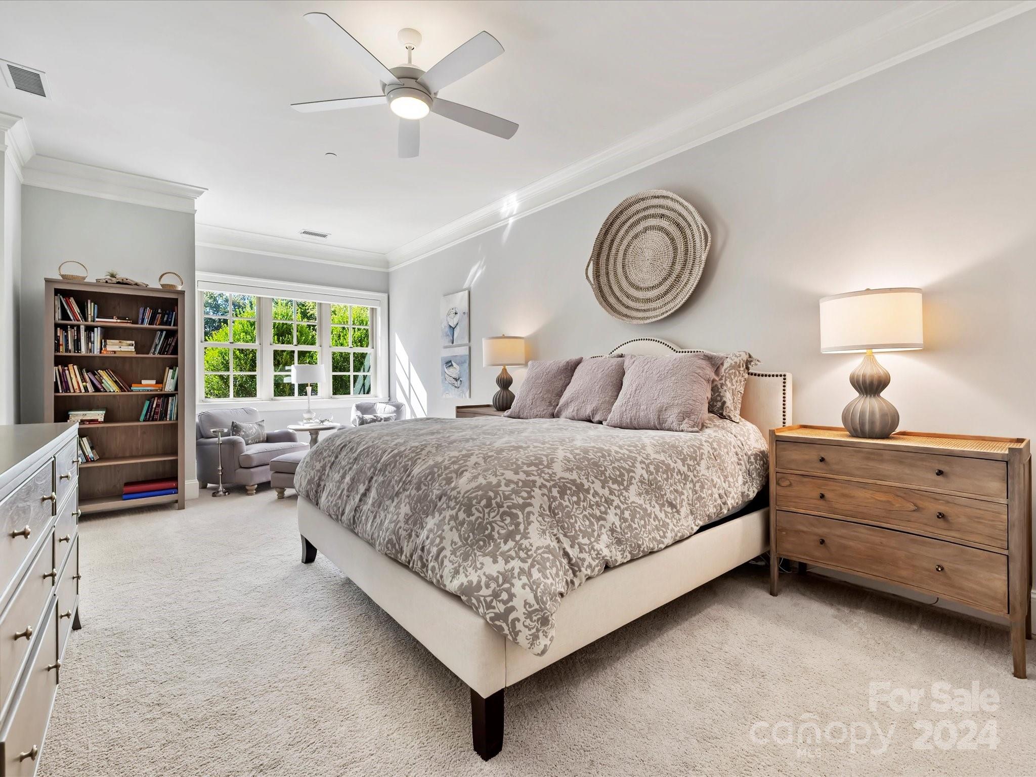 2823 Providence Road, Unit 216 Charlotte, NC 28211 - Photo 19 of 35 a bedroom with a bed and a large window with the outer view