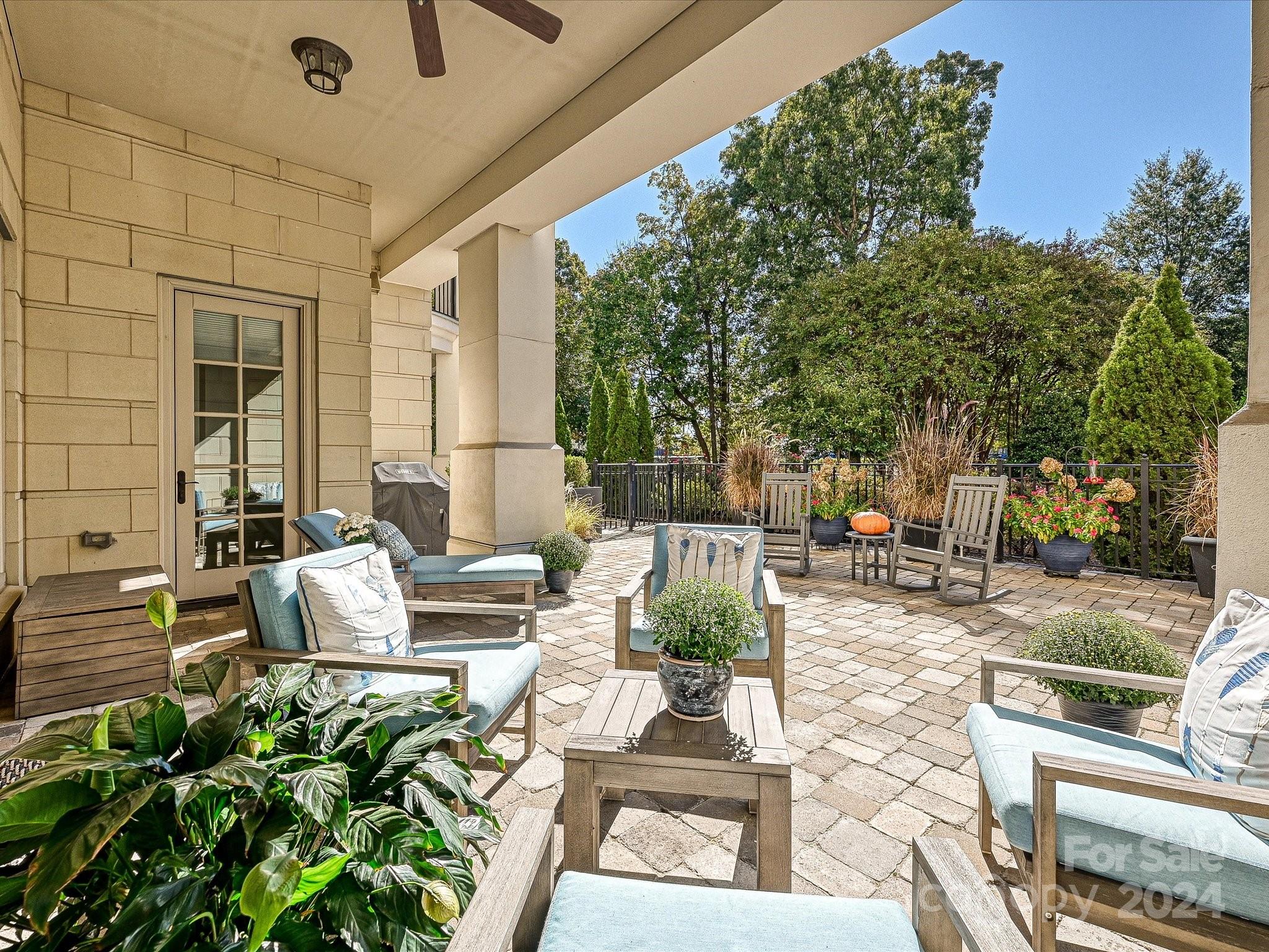 2823 Providence Road, Unit 216 Charlotte, NC 28211 - Photo 28 of 35 a view of patio with couches and potted plants