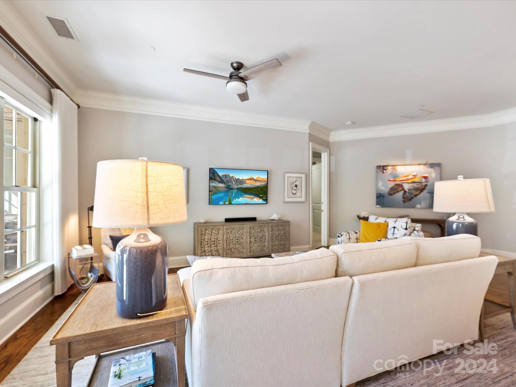 2823 Providence Road, Unit 216 Charlotte, NC 28211 - Photo 8 of 35 a living room with furniture and a window