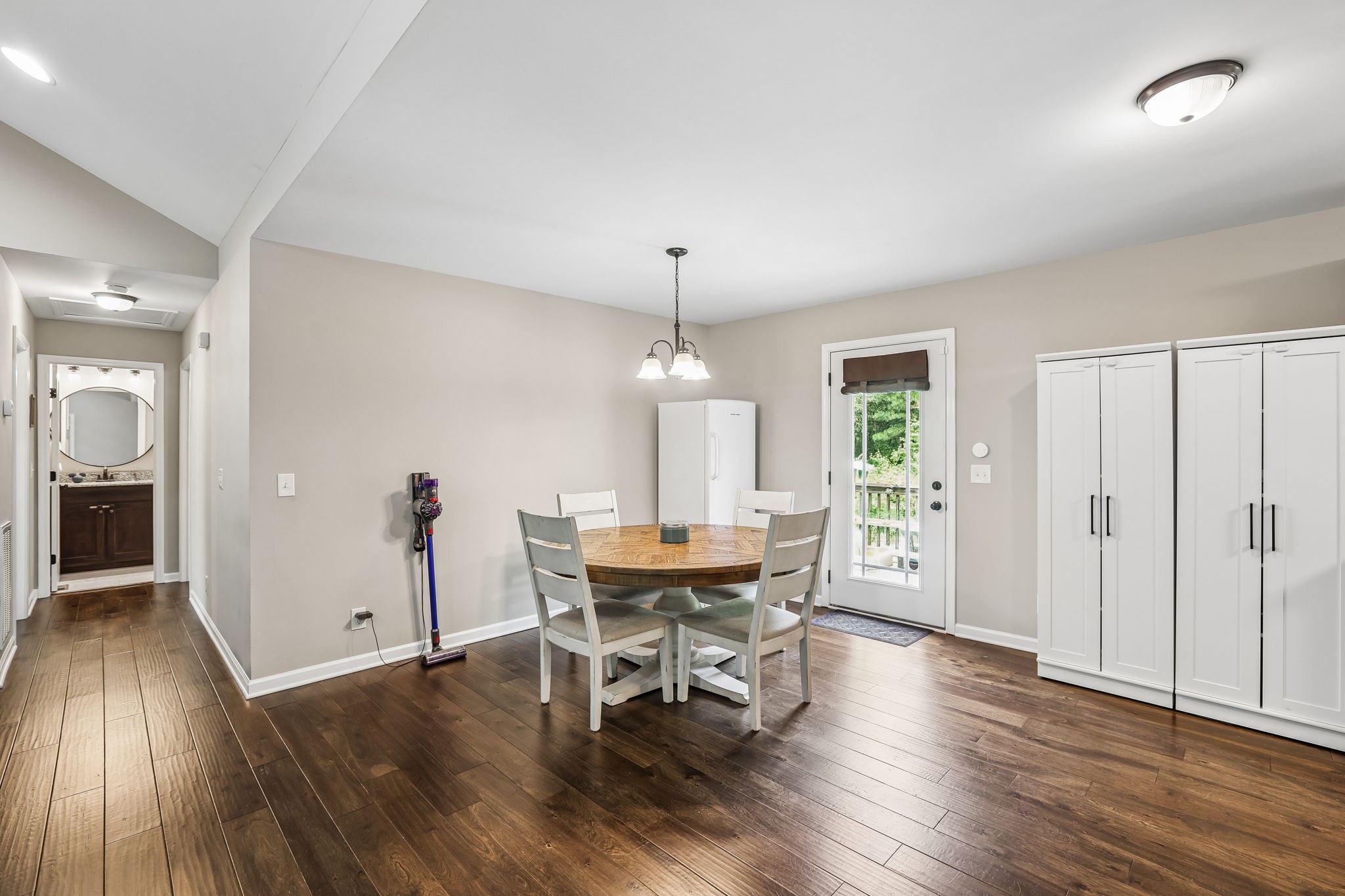 1546 South Spring Street Manchester, TN 37355 - Photo 17 of 53 a dining room with furniture window and wooden floor
