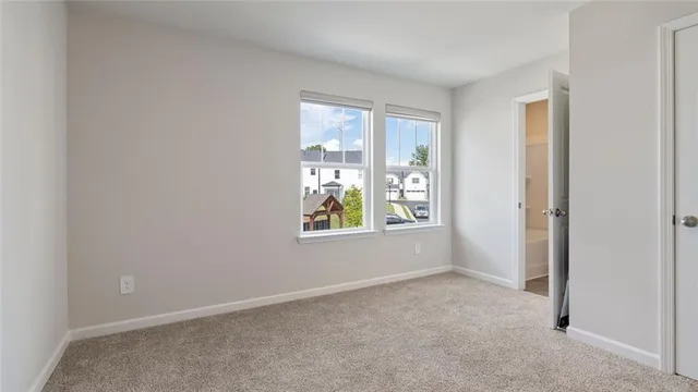a view of an empty room with window