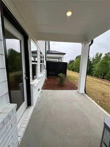 a view of a balcony with an outdoor space