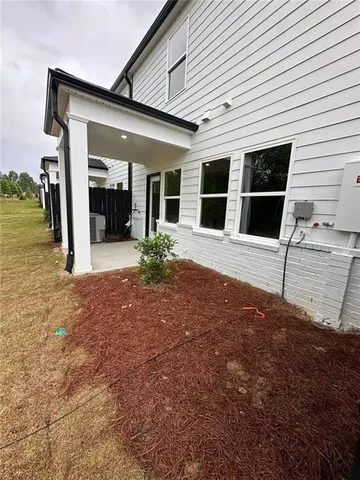 a front view of a house with a porch