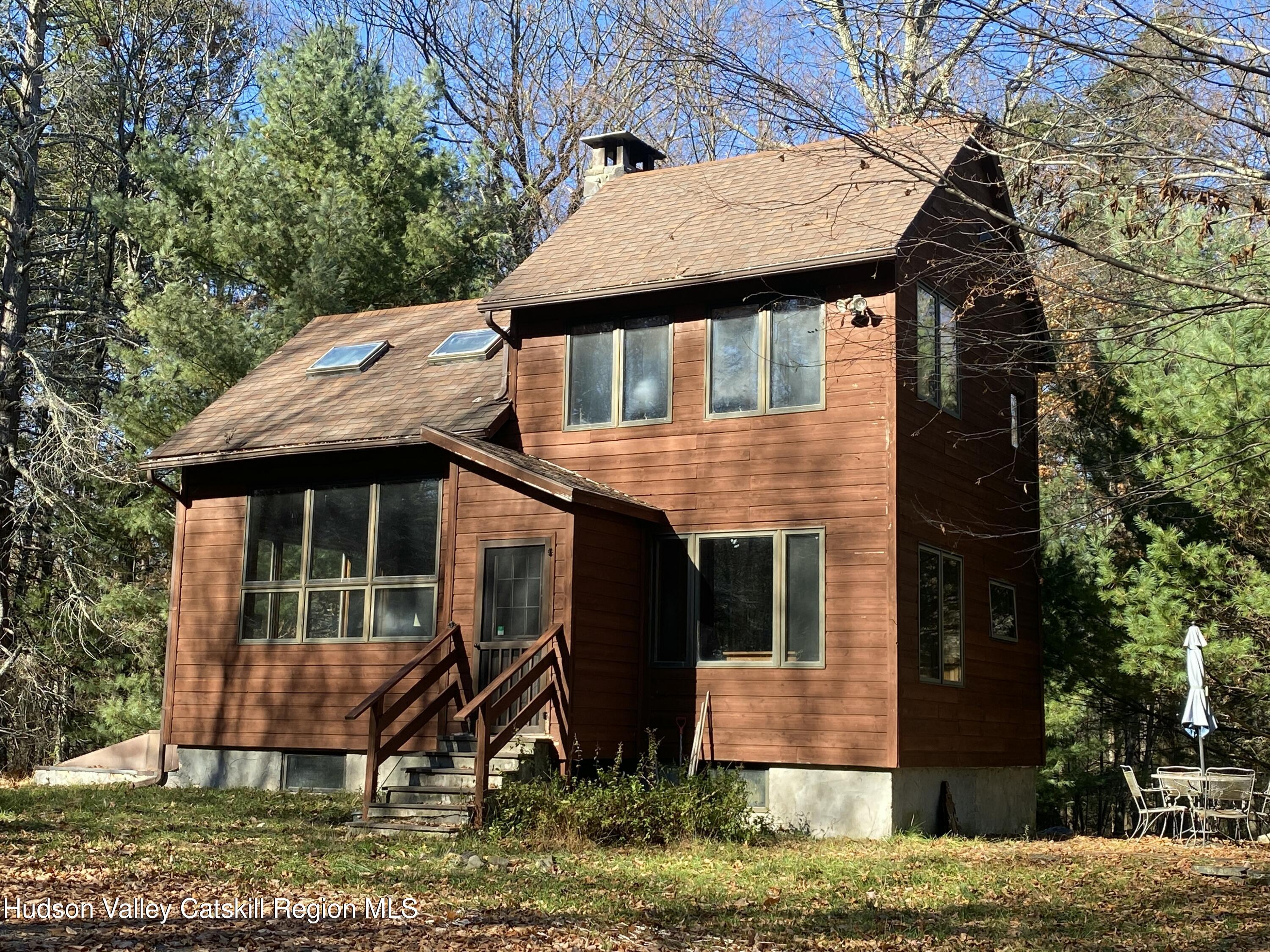 250 Macdaniel Road Woodstock, NY 12498 - Photo 39 of 39 a view of a house with a yard