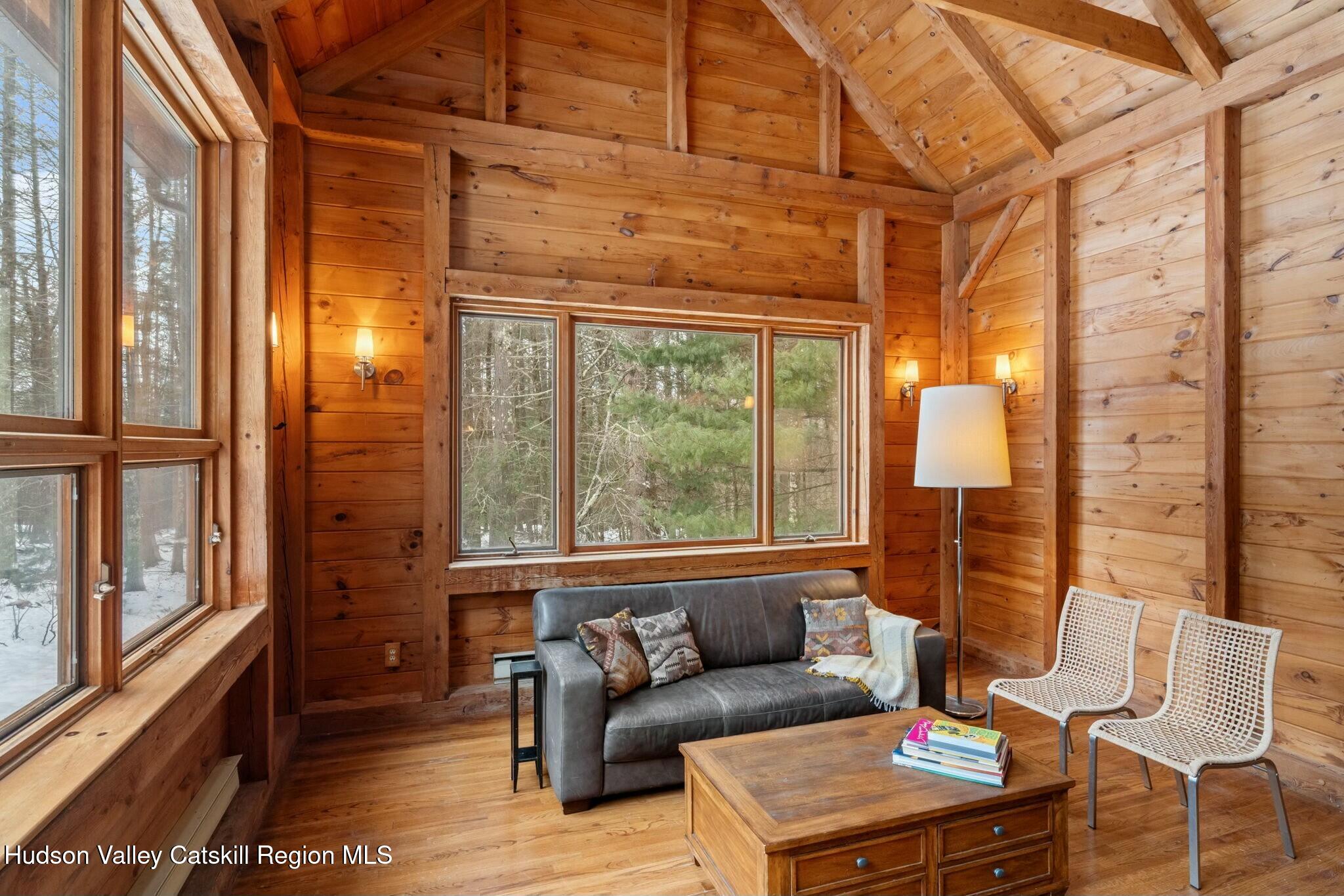 250 Macdaniel Road Woodstock, NY 12498 - Photo 5 of 39 a living room with furniture and a window