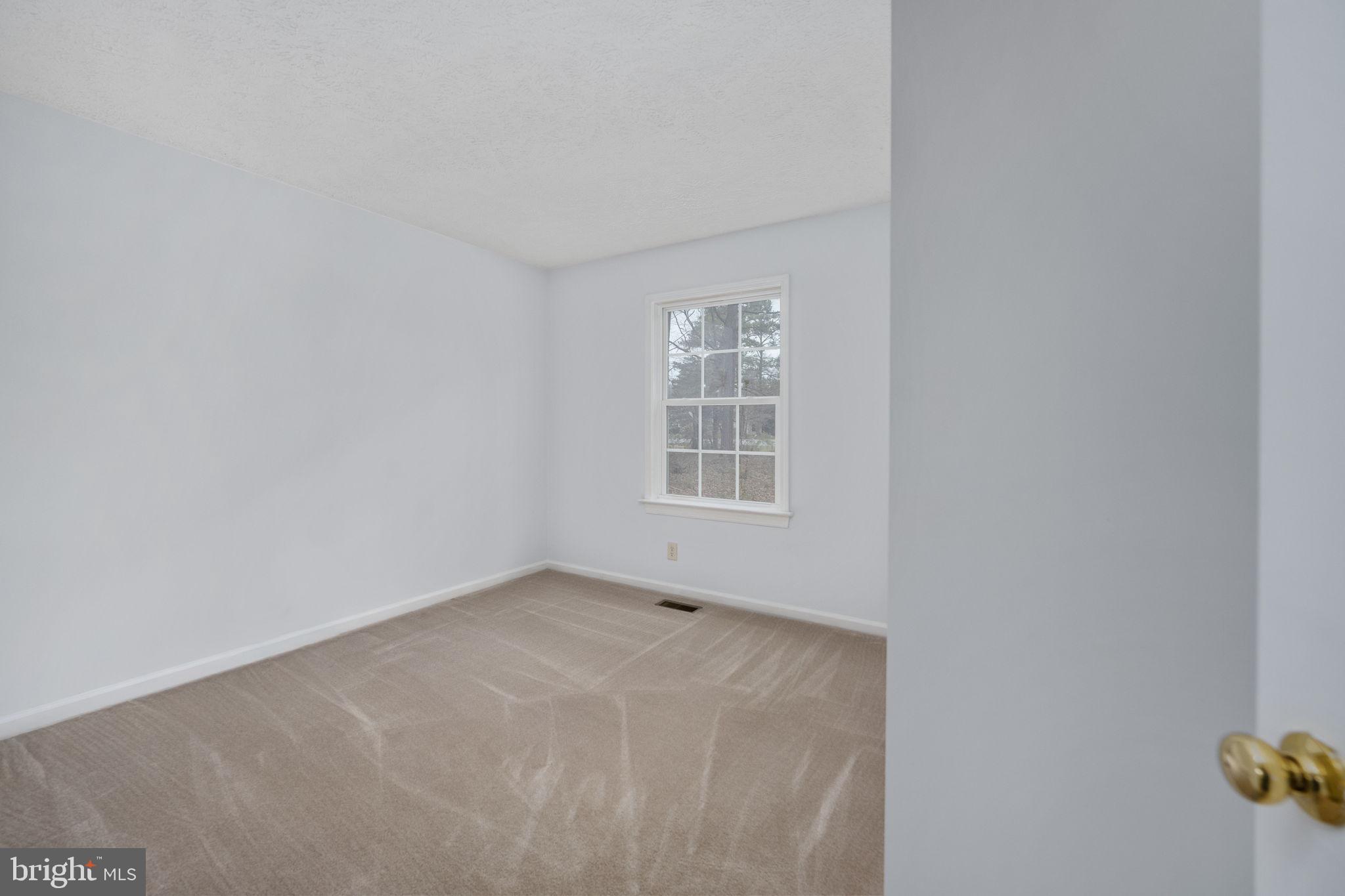 67 Stern Way Montross, VA 22520 - Photo 40 of 74 a view of an empty room with a window