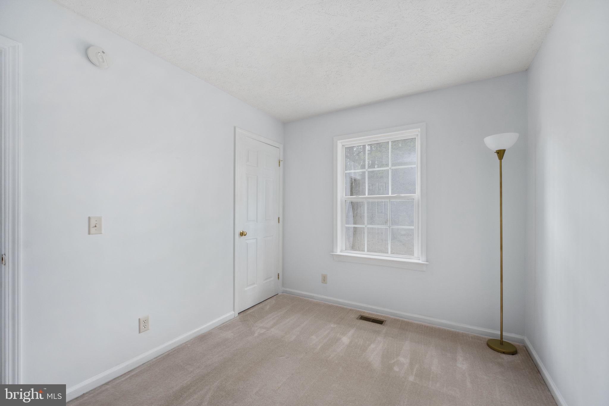 67 Stern Way Montross, VA 22520 - Photo 46 of 74 a view of an empty room with a window