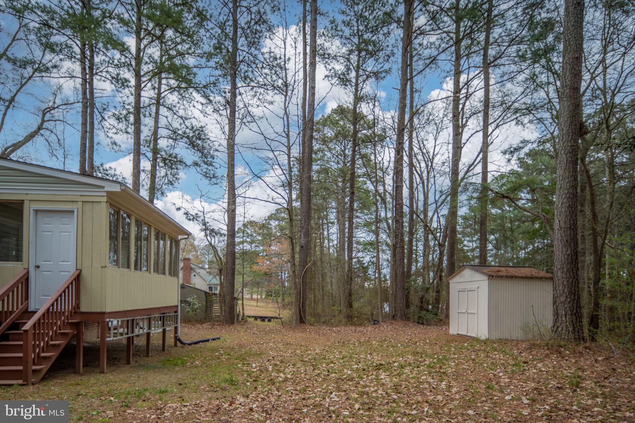 67 Stern Way Montross, VA 22520 - Photo 52 of 74 a view of a house with backyard and sitting area