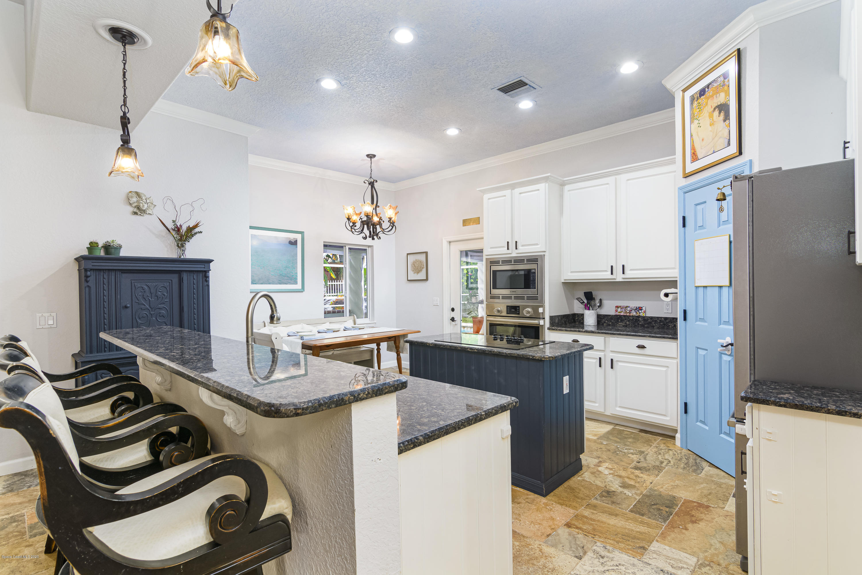 18 River Ridge Drive Rockledge, FL 32955 - Photo 14 of 57 Kitchen w/breakfast bar and island
